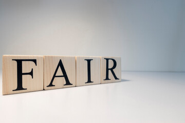 Fair word from wooden cubes. About law terms.