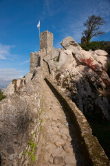 Defensive walls and tower at the Castelo dos Mouros (The Moors Castle) at Sintra, Portugal, Europe...