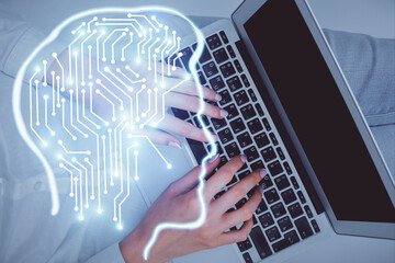 Double exposure of woman working on computer andhuman brain hologram drawing. Top View. Ai concept.