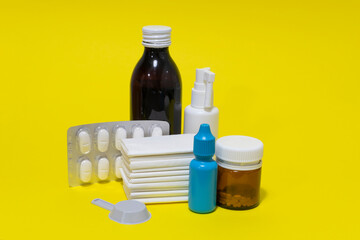 Tissues, nose drops, thermometer, cough syrup, spray,