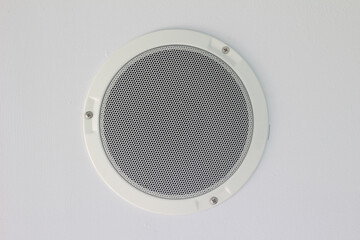 Speakers on ceiling in the building.