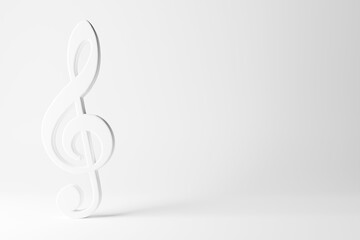 White music treble clef symbol standing on white background with copy space - modern minimalistic music concept