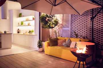 cozy furnished summer patio with open space kitchen