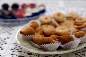 several delicious snacks with chicken on white plate