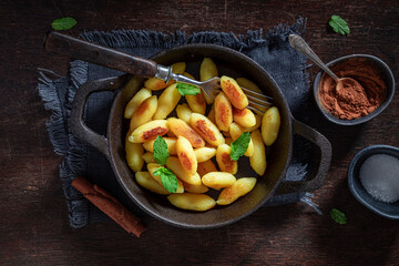 Delicious potato dumplings served with sugar and cinnamon