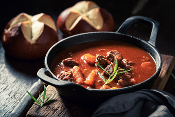 Homemade goulash served with fresh hot buns
