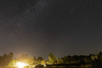 Fototapeta premium A sign in front of a sunset