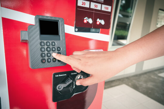 Automatic Sell Vending Machine For Food And Beverage Industry, Woman Hand Pressing Button Number On Keyboard And Control Display For Buying Food Products In Vending Machines. Service Selling Machine