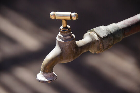 Old faucet with new handle in Santiago Humberstone Oficina Salitrera, Atacama Desert, Norte Grande, Chile