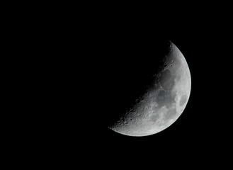 close-up of half moon isolated in the dark