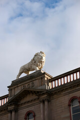 Huddersfield, West Yorkshire, UK, October 2013, the lion statue on Lion Arcade, John William...