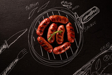 Roasted sausage on black chalkboard with painted pan and ingredients. top view. Barbecue concept.