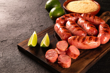 Fresh grilled Pepperoni sausage. Grilled Pepperoni Sausage on wooden board. 