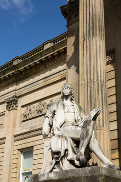 Liverpool, Merseyside. June 2014, External View of the statue of Raphael by John Warrington Wood (installed 1877) and the columnades of the Walker Art Gallery