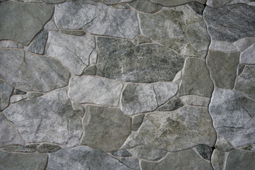 Rock texture wall background. Rock grey, green, white.