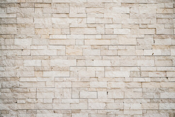 Old grunge white brick abstract background.