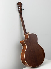 Naklejka premium acoustic guitar back on white background