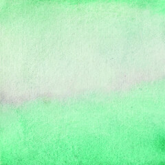 Green abstract watercolor background, hand paint. Color splashing on the paper