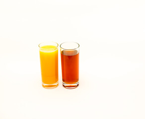Delicious freshly squeezed fruit juice isolated against a white background 