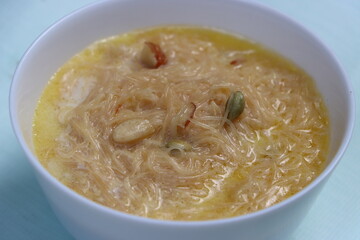 Kheer or vermicelli pudding garnished with dry fruits, festival sweet dish