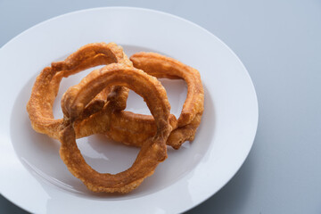 Traditional food jiaoquan in old Beijing of China. Old Beijing specialty food jiaoquan. Fried doughnut, a traditional snack in Beijing.