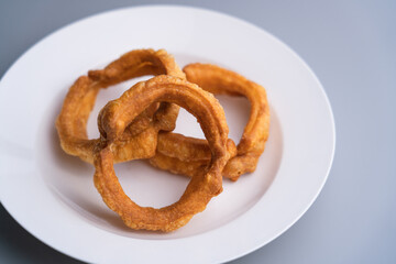 Traditional food jiaoquan in old Beijing of China. Old Beijing specialty food jiaoquan. Fried doughnut, a traditional snack in Beijing.