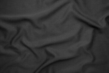 Background texture black cloth. Abstract dark wavy soft. Fabric is wrinkled. Fashion luxury style.