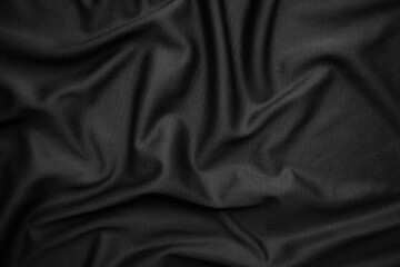 Background texture black cloth. Abstract dark wavy soft. Fabric is wrinkled. Fashion luxury style.