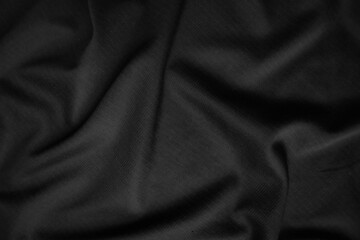 Background texture black cloth. Abstract dark wavy soft. Fabric is wrinkled. Fashion luxury style.