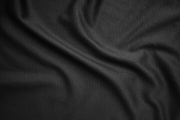 Background texture black cloth. Abstract dark wavy soft. Fabric is wrinkled. Fashion luxury style.