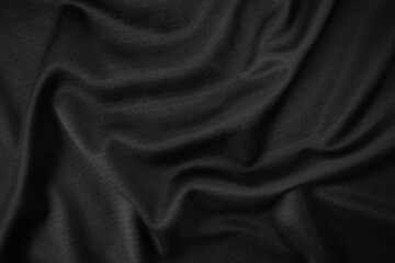 Background texture black cloth. Abstract dark wavy soft. Fabric is wrinkled. Fashion luxury style.