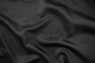 Background texture black cloth. Abstract dark wavy soft. Fabric is wrinkled. Fashion luxury style.