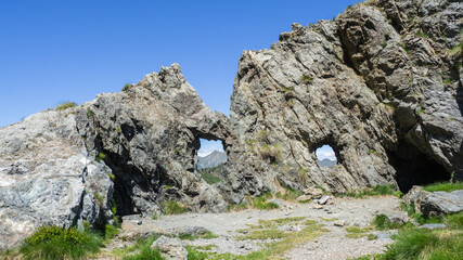 Trenches of the First World War at the Italian Alps. Cadorna line. San Marco Pass, Bergamo. Openings in the rock overlooking the Alps towards the Swiss border