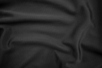 Fototapeta premium Background texture black cloth. Abstract dark wavy soft. Fabric is wrinkled. Fashion luxury style.