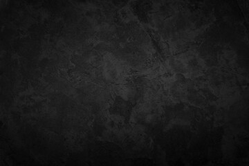 Close up retro plain dark black cement & concrete wall background texture for show or advertise or...