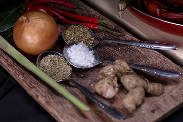 Spice And Herbs In Decoration With Black Background