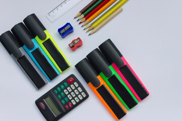 School market. Purchase in supermarket. School supplies concept. Shopping basket with pencils paints and apple fruit close up. Back to school.stationery flatly. preparing for school by September 1 © Ankomun