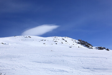Obraz premium Panoramic view of the mountains of France on a winter sunny day. Haute Savoy, France. Snow Park.