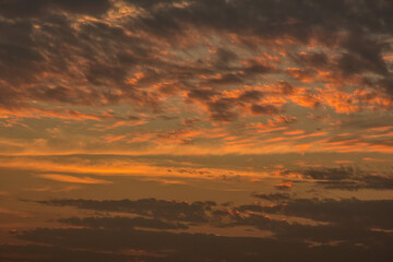 Sunset with clouds and light rays  other atmospheric effect for use as a background image