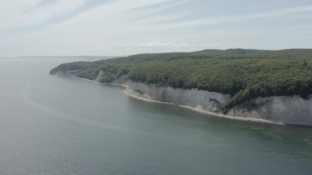 Drone Aerial Shot of the chalk cliffs on Ruegen R&uuml;gen in Germany in beautiful light with green and blue seawater, Europe