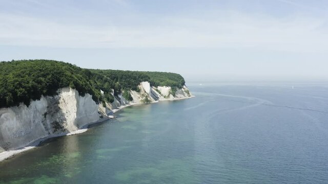 Drone Aerial Shot of the chalk cliffs on Ruegen R&uuml;gen in Germany in beautiful light with green and blue seawater, Europe