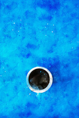 Abstract painting of cup on blue background, nature landscape image, digital watercolor illustration, art for background