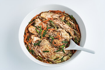 Close up traditional Korean dish kimchi in a white plate on a white background