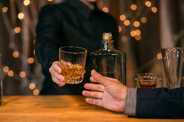 Waitress pouring whiskey glass customers sit drink