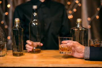 Celebrate whiskey on a friendly party in  restaurant