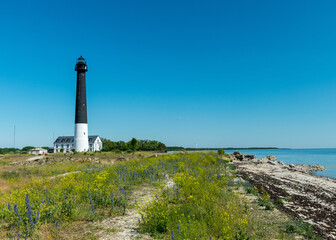Fototapeta na wymiar Sightseeing of Saaremaa island in sunny clear day . Sorve lighthouse, Saaremaa island, Estonia