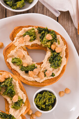 Friselle with turnip tops and hummus.
