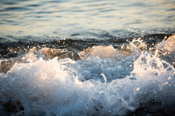 Blurred blue background with white waves