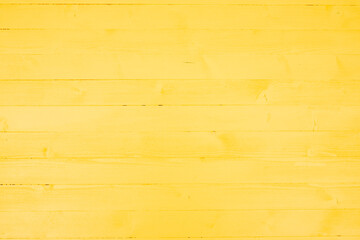 Yellow background made of small wooden boards