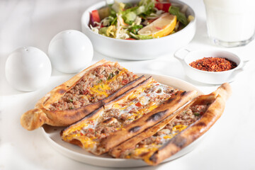 Assorted Turkish foodset. pide with meat , pide with egg, pide mix, lachmajun
